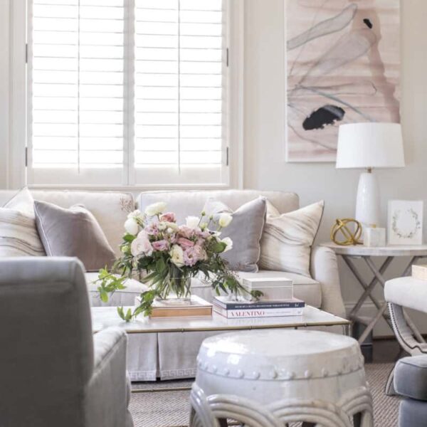 Emily Hertz white living room featured in Glitter Guide