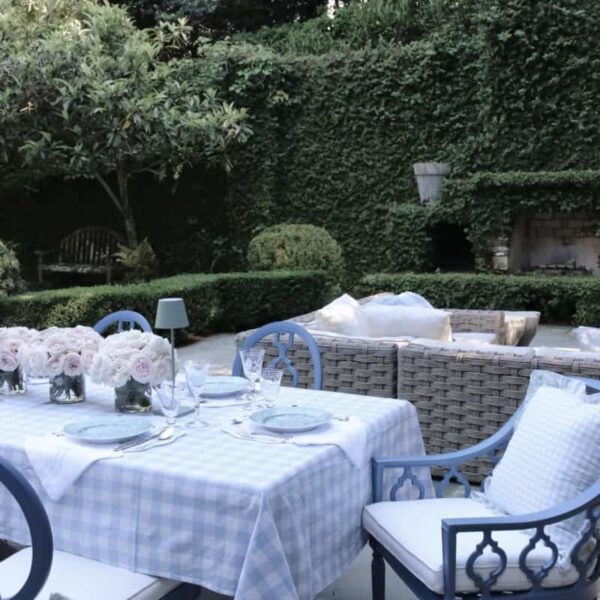 grandmillennial entertaining - outdoor dining and pretty patio deecor