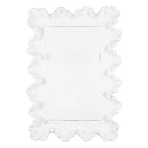 white scalloped mirror grandmillennial interior design
