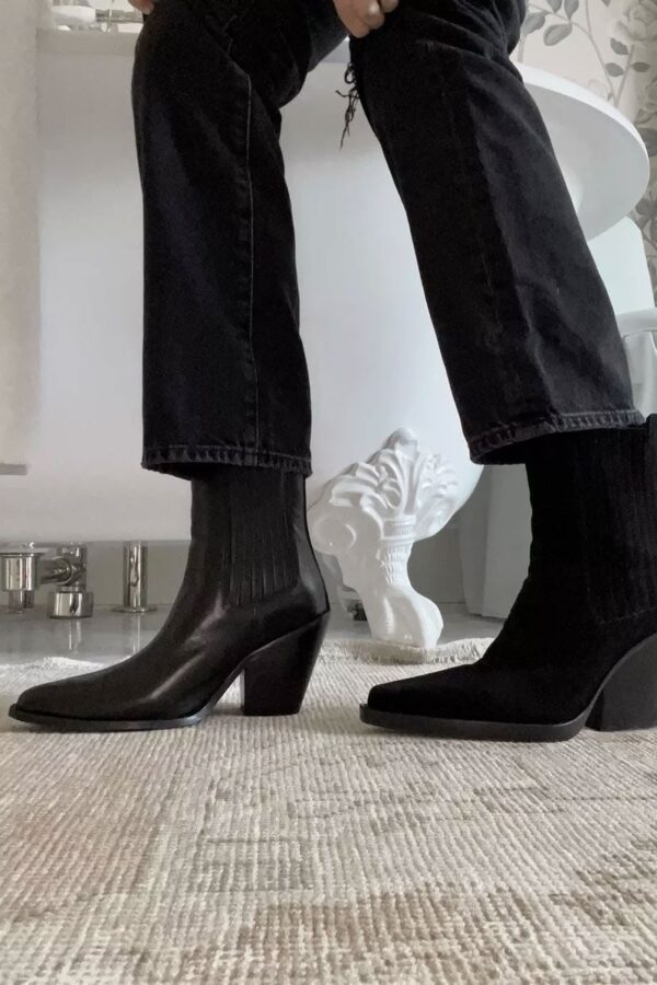comparing two black boots for fall