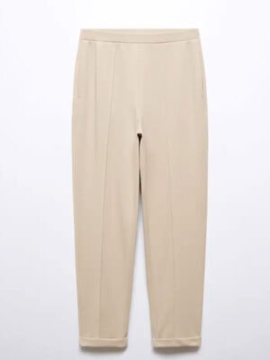 Cream Jogger pants with seam detail