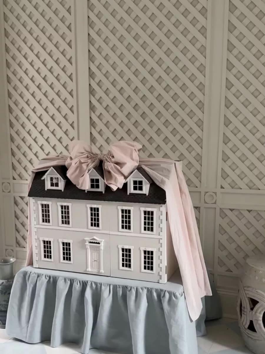 pretty dollhouse with big pink bow from born on fifth - grandmillennial style