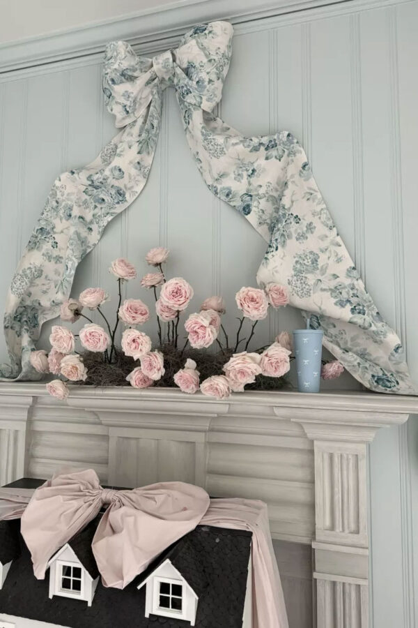 garden roses on mantel with oversized toile bow - grandmillennial decor ideas