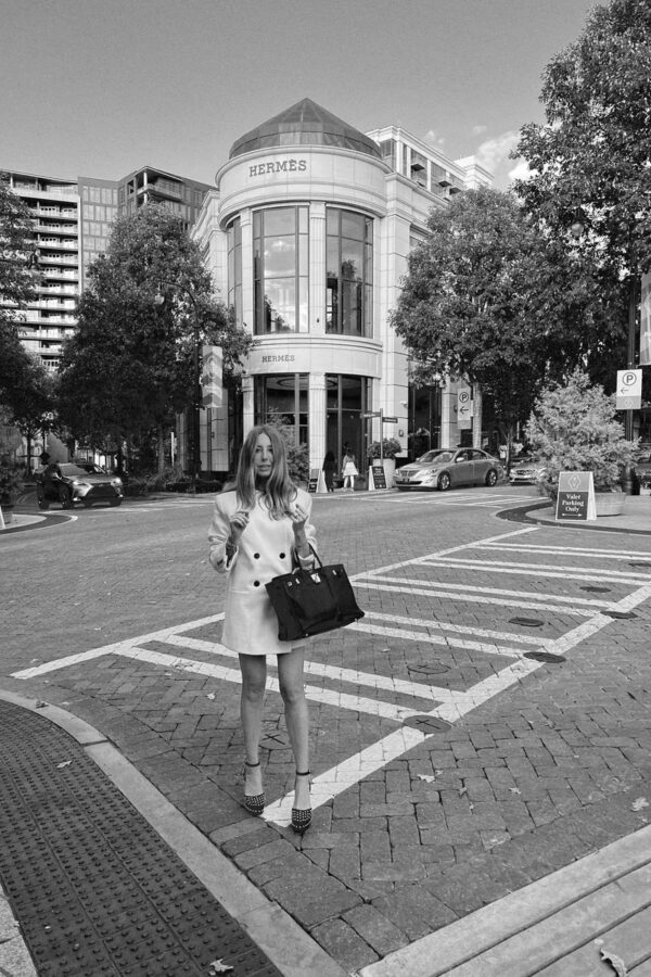 black and white photo of emily wearing oversized blazer for fall