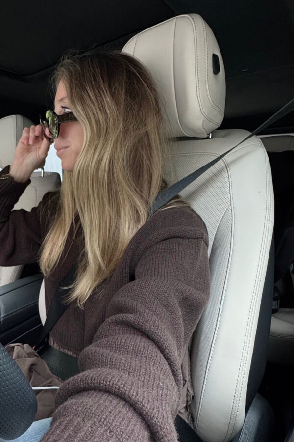 emily wearing chocolate brown sweater and sunglasses for fall