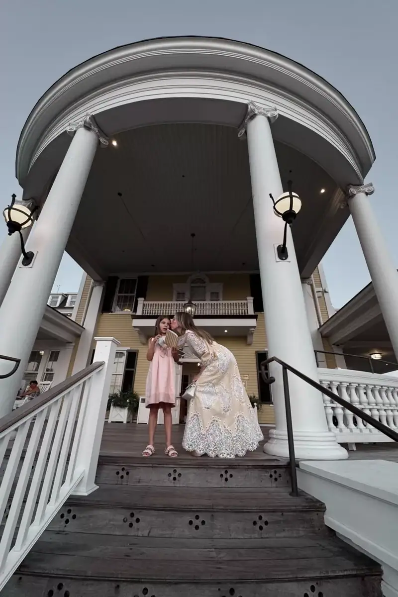 Emily with Elle - wearing white summer dress by designer Borgo de Nor