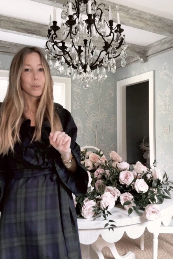 Emily in tartan robe in home with garden roses for gifts under $30 guide