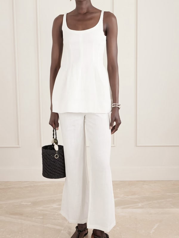 model wearing all white linen set
