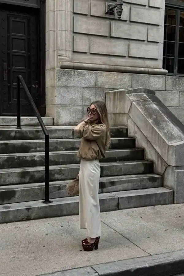 Emily wearing 1970s inspired outfit with Veronica Beard Ainsworth Jacquard Jacket + Chloe Meret Clogs