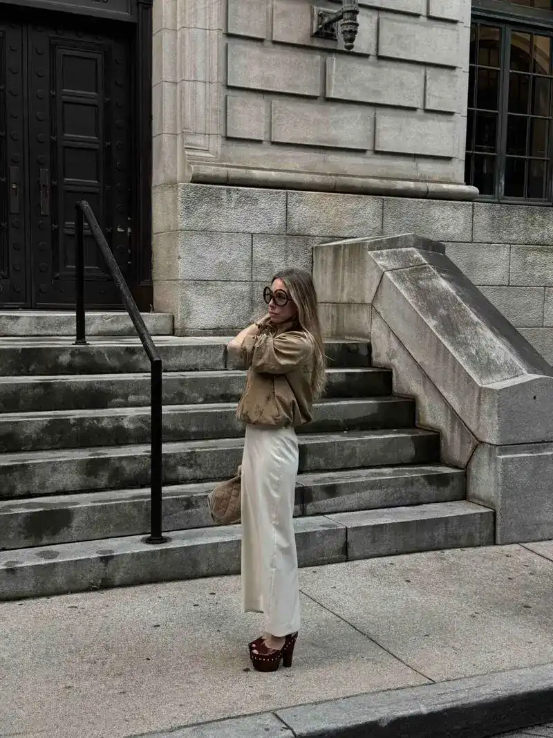 Emily wearing 1970s inspired outfit with Veronica Beard Ainsworth Jacquard Jacket + Chloe Meret Clogs