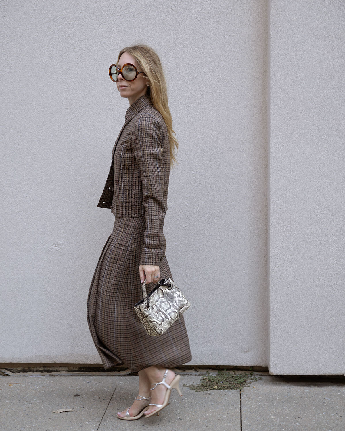 Houndstooth jacket and skirt set with round Celine sunglasses