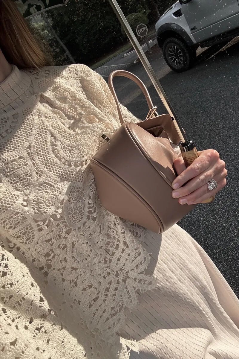 Emily wearing Sea Alina lace cape for fall outfit.