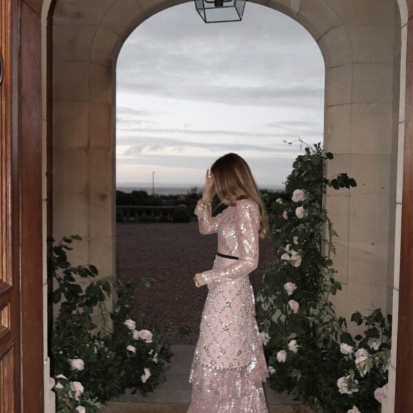 Blush and silver sparkly pink dress for 40th birthday, with garden roses in background