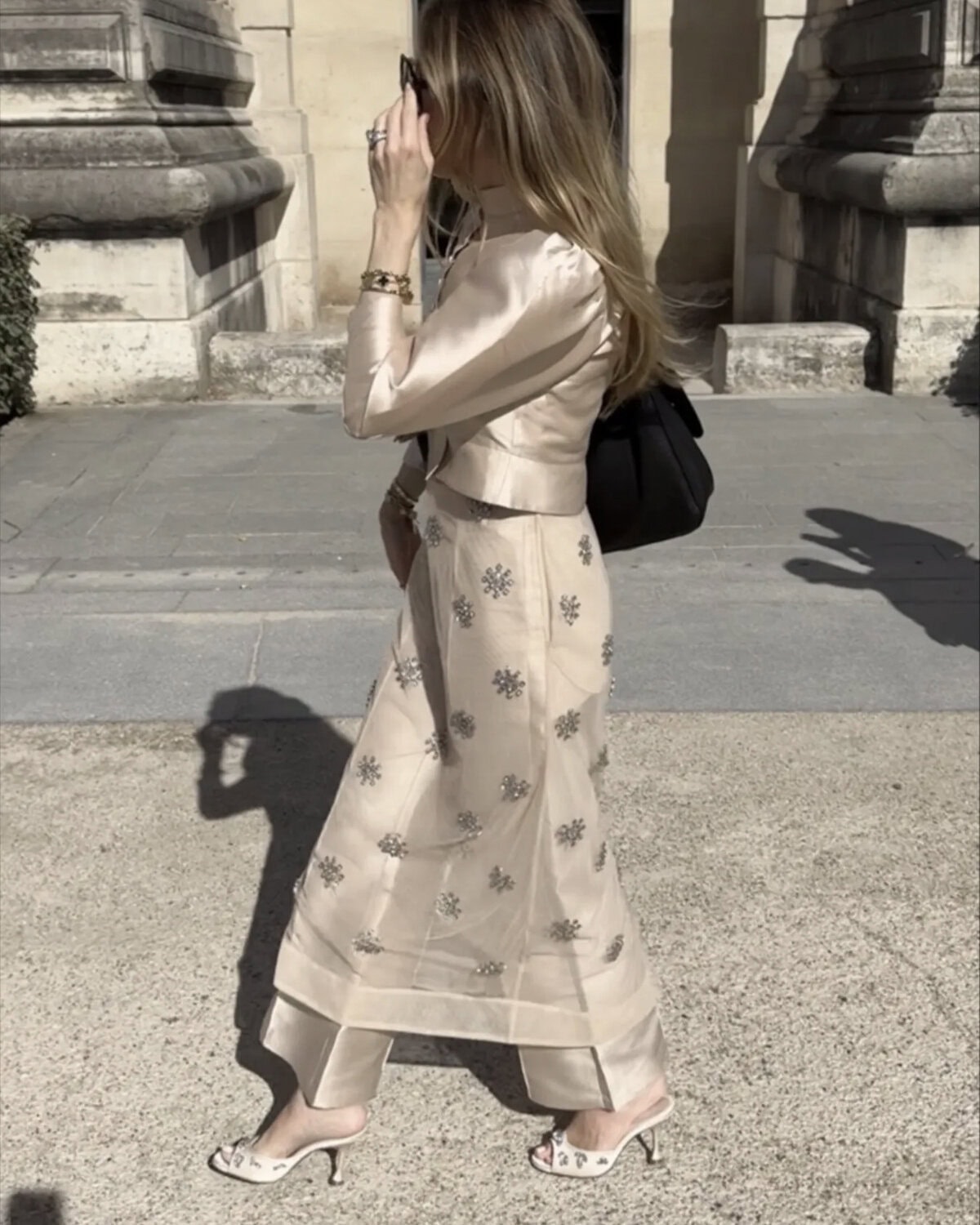 emily wearing blush set with dress and pants