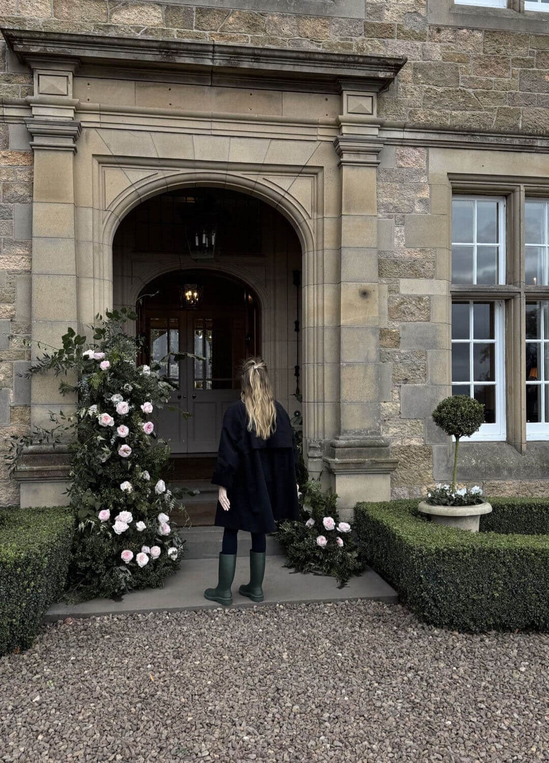 Emily wearing The Row coat