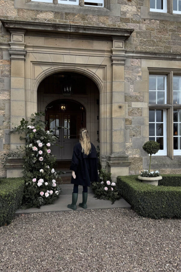 Emily wearing The Row coat